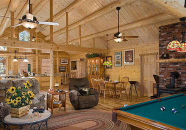 Large great room with pool table, seating, and dining area.