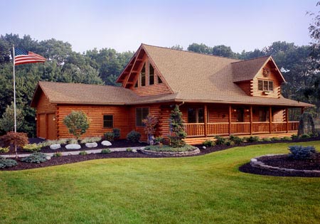 Large cedar log home with front porch and garden