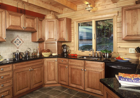 Kitchen with wooden cabinets, window, and countertop