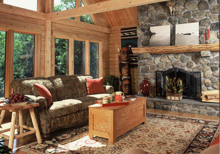 Living room with stone fireplace and wooden furniture