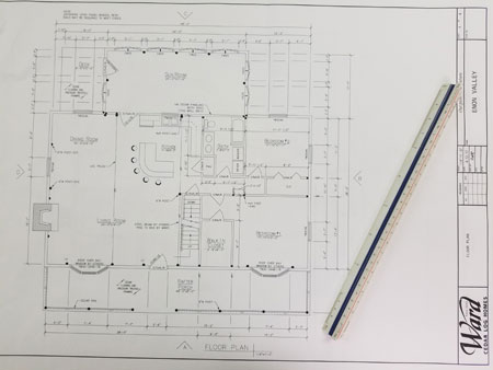 Architectural floor plan drawing with a ruler on the side.